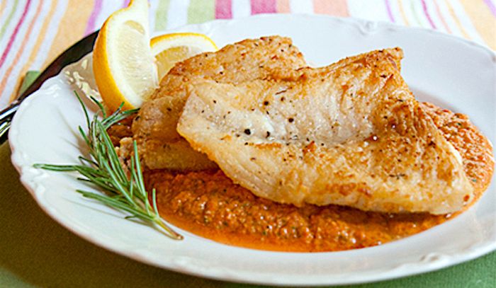 Filetti di pesce con arancia e pomodoro