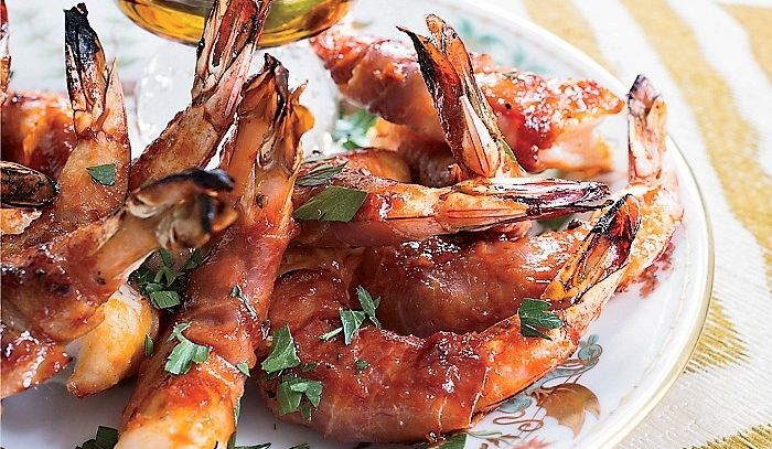 Scampi al prosciutto e zucchine