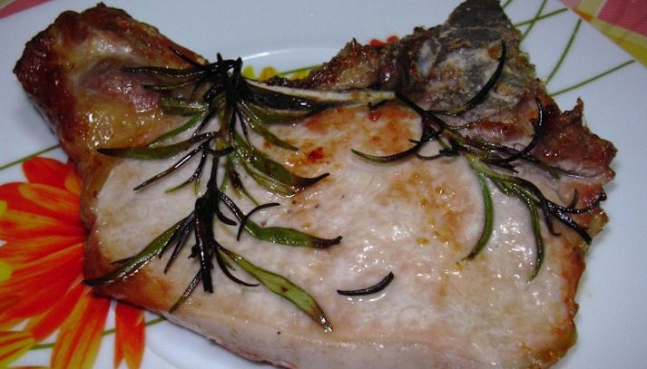 Braciole di maiale pomodori e finocchi